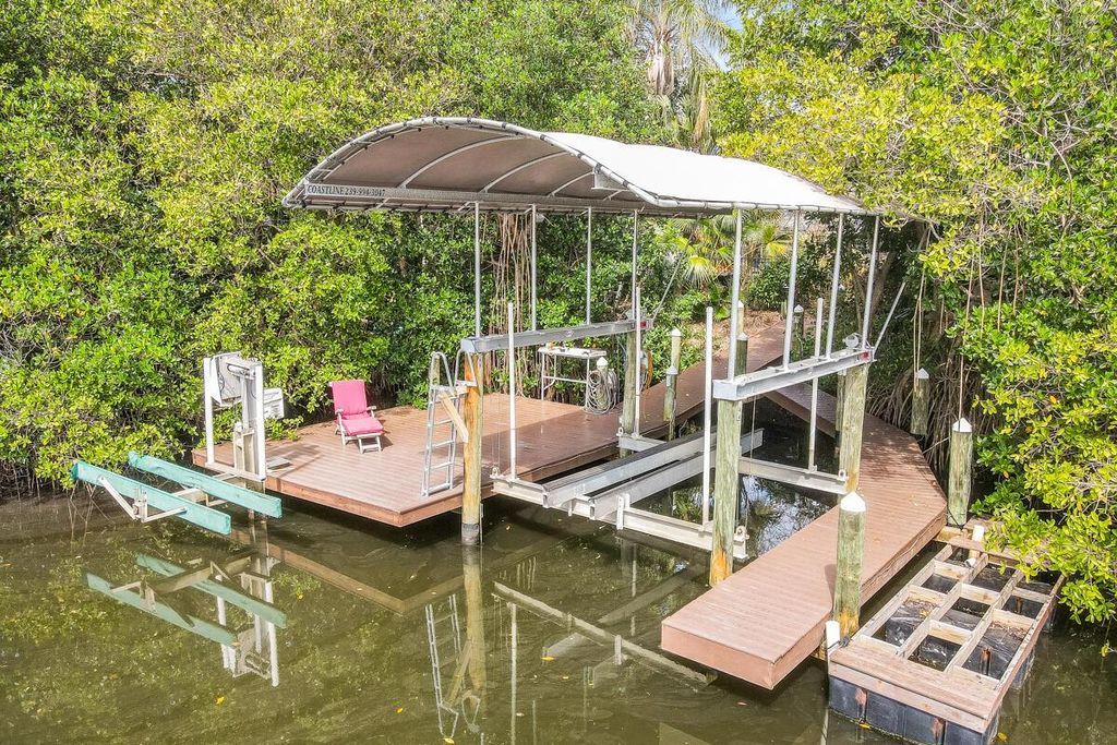 Photo of 8824 SE Marina Bay Drive, Hobe Sound, FL 33455 (MLS # R11000748)