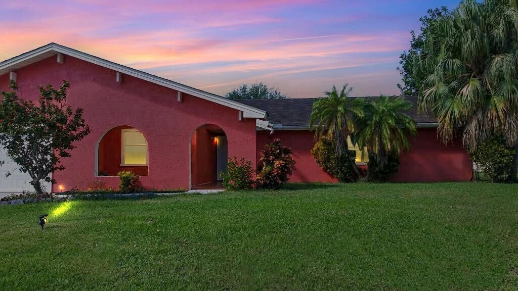 Photo of 2191 SE Abcor Road, Port Saint Lucie, FL 34952 (MLS # R10750247)