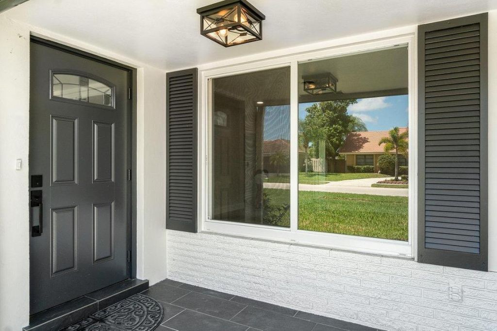 Photo of 928 SW 4th Street, Boca Raton, FL 33486 (MLS # R10996267)