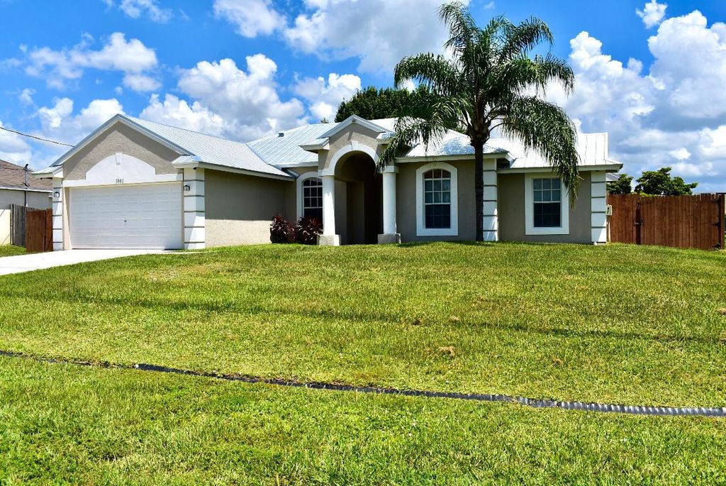 Photo of 1561 SW Gadsan Avenue, Port Saint Lucie, FL 34953 (MLS # R11111441)