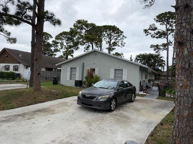 Photo of 4891 Carver Street, Lake Worth, FL 33463 (MLS # B26092748)