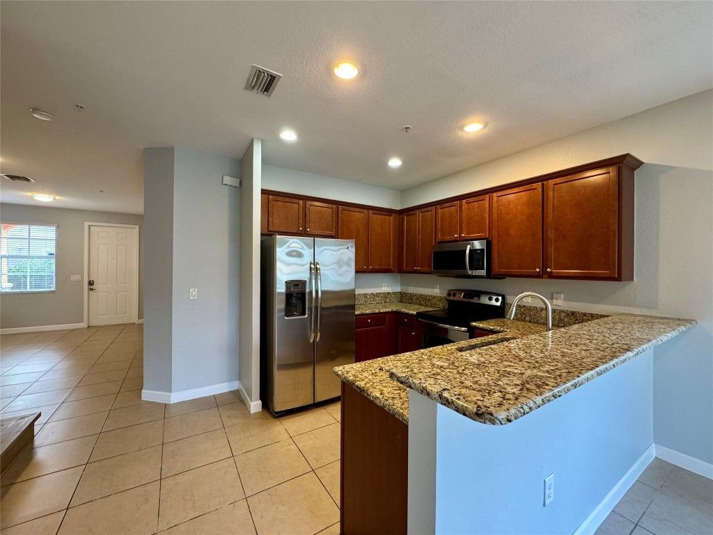 Photo of 12457 Emerald Creek Manor #12457, Plantation, FL 33325 (MLS # F10540286)