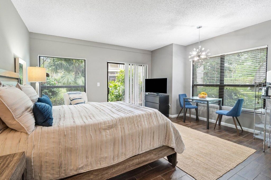 Photo of 11863 Wimbledon Circle #407, Wellington, FL 33414 (MLS # B26012254)