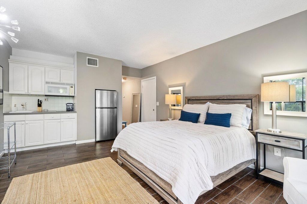 Photo of 11863 Wimbledon Circle #407, Wellington, FL 33414 (MLS # B26012254)