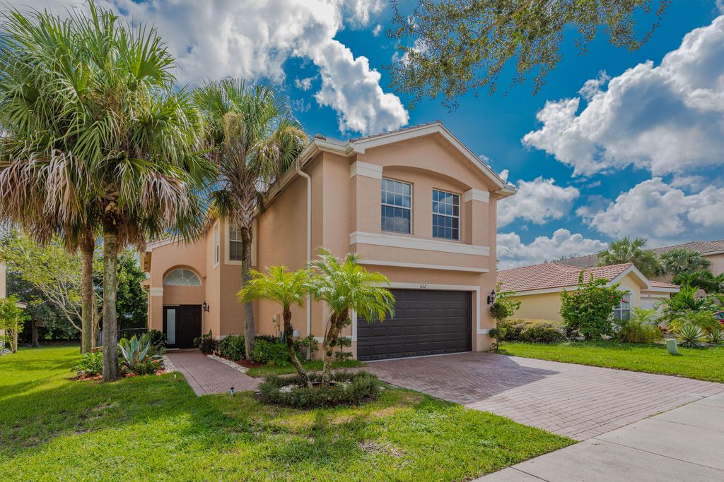 Photo of 622 S Peppergrass Run S, Royal Palm Beach, FL 33411 (MLS # B26031587)