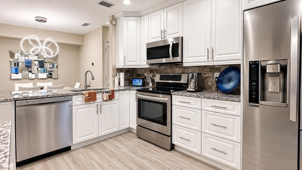 Photo of 14917 WEDGEFIELD Drive #203, Delray Beach, FL 33446 (MLS # B26076796)
