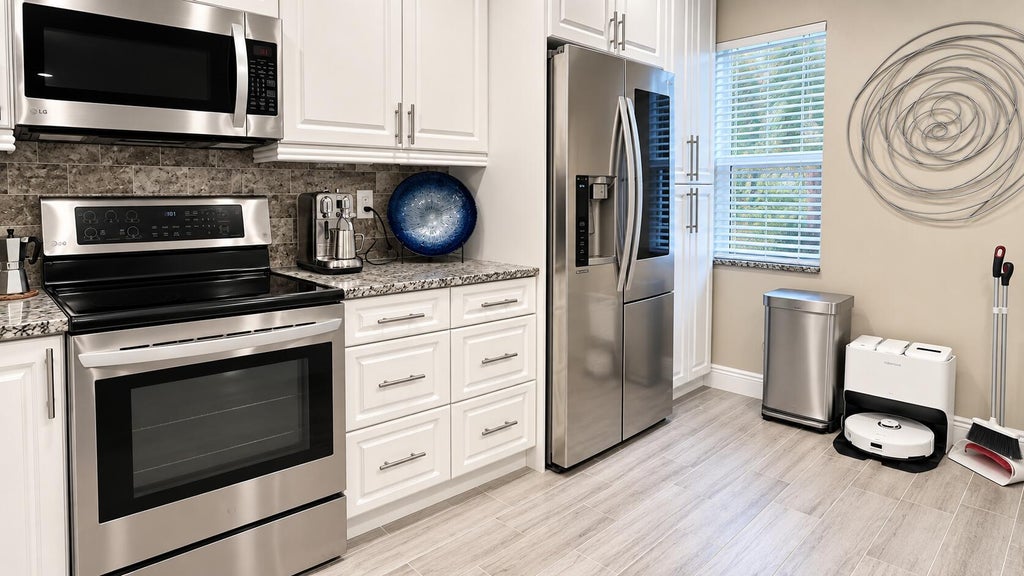 Photo of 14917 WEDGEFIELD Drive #203, Delray Beach, FL 33446 (MLS # B26076796)