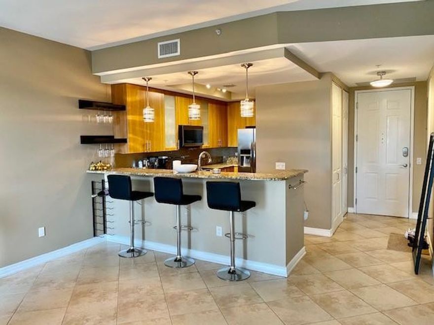 Rare One Bedroom and Two Full Baths. Tenant has lease until 12-31-23. New Air Conditioning and Water Heater 2022. Stainless Steel Refrigerator, stove, microwave, and dishwasher have been replaced along with Washer-Dryer. Granite Counter Tops and 42" Cabinets. Tile in Main Areas and carpet in Bedroom with Custom Closet. This is a South Facing Unit which is nice and bright with Two Balconies. Wilton Station is a Gated Community with Fitness Center, Party Room, Warming Kitchen, Conference Room, Media Room, Library and Billiard Area. Bicycle and Canoe-Kayak Storage. Pet Friendly up to two (non aggressive) seventy five pound dogs. HOA includes Internet, Cable, Water, Sewer, Trash, Fully Funding Reserves, Pool, Clubhouse, Guard House, Landscaping & Manager. Close to Nightlife, Beaches & Highways