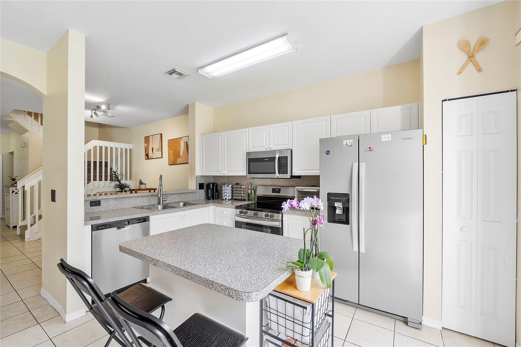 Spacious townhouse with 1,848 Sf, offers 4B/2.5B. The open concept design provides a flowing, inviting layout with plenty of natural light. Brand new appliances in the kitchen complement the tile in first floor, creating a comfortable living space. The exterior of the home boasts lush landscaping, providing a serene and well-maintained environment. The townhouse features an end-unit design, offering additional privacy and greenspace you are allowed to fence your property for more privacy. The primary bedroom and three additional bedrooms provide ample space, The layout includes a family room, offering a versatile space for gatherings or leisure activities. The largest patio for entertainment and BBQ. New roof will be installed soon. AC is 2020. Two Pools and playground for area for kids.