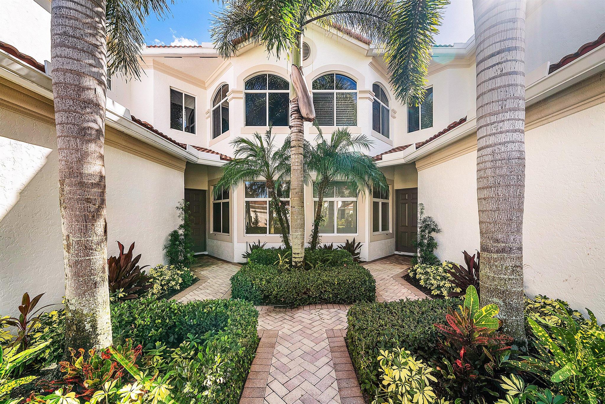 This stunning, newly renovated 1st-floor unit condo at 106 Palm Bay Drive, B, in Palm Beach Gardens offers 2 bedrooms, 2 bathrooms, plus a versatile den/office, spanning 2,085 SF. Enjoy serene and private lake views from the bright sun filled patio, complete with impact glass sliders for peace of mind. The modern interior features new flooring, stainless steel appliances, and sleek quartz countertops. A 2-car garage adds convenience. Available for annual unfurnished rental at a 6 month minimum. No membership conveyed with this rental. Experience luxury and tranquility in this exquisite Ballenisles retreat!