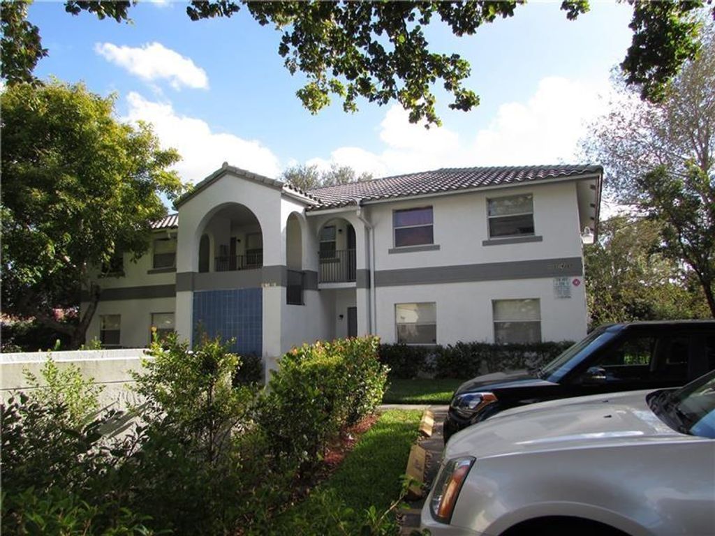 Photo of 4053 NW 114th Avenue, Coral Springs, FL 33065 (MLS # F10493923)