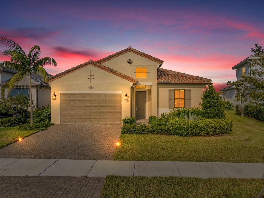 This 2024 CBS home in PGA Verano offers a split floor plan, premium upgrades and a move-in-ready lifestyle. Featuring 3BR/2BA, this bright and open layout includes impact glass, sleek tile flooring, quartz counters, stainless appliances, 16'x10' sliders, and a large kitchen island. The extended lot showcases long lake views, ideal for a future pool. Enjoy a spacious primary suite with spa-like bath and walk-in closet. Verano's resort-style amenities include indoor/outdoor pools, 27 pickleball courts, clubhouse, fitness, tennis, and more. HOA includes cable, internet, lawn care, and security.