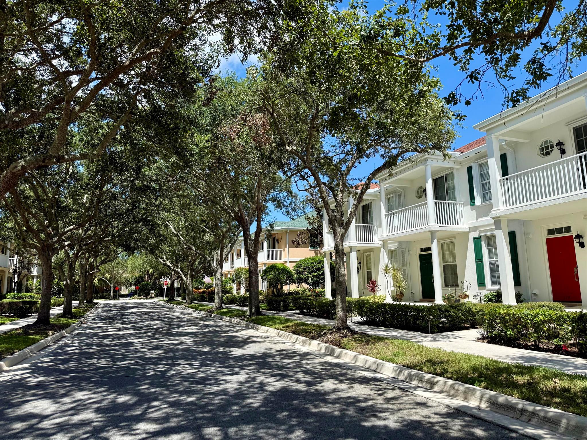 This exquisitely reimagined 3-bedroom, 2.5-bath townhouse is situated on a serene, tree-lined street within a desirable community. Every aspect of the home has been meticulously renovated with high-end finishes -- from the brand-new impact windows to the custom kitchen, luxurious bathrooms, and sleek new flooring throughout.Enjoy a spacious and well-designed layout offering abundant closet space and natural light. The property also includes a rare 2-car garage, providing ample storage and convenience.Residents enjoy access to a beautifully maintained community center featuring a large pool, clubhouse, and playground. Zoned for highly regarded Jupiter area schools and just minutes from top-tier dining, shopping, and pristine beaches.