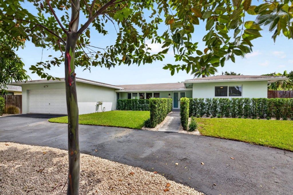 Photo of 410 SW 55TH Terrace, Plantation, FL 33317 (MLS # B26078778)