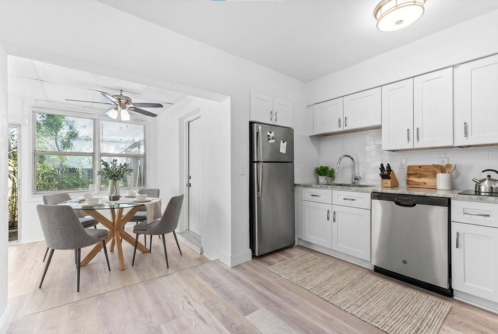 Photo of 308 STILLWATER Drive, Jupiter, FL 33458 (MLS # B26091613)