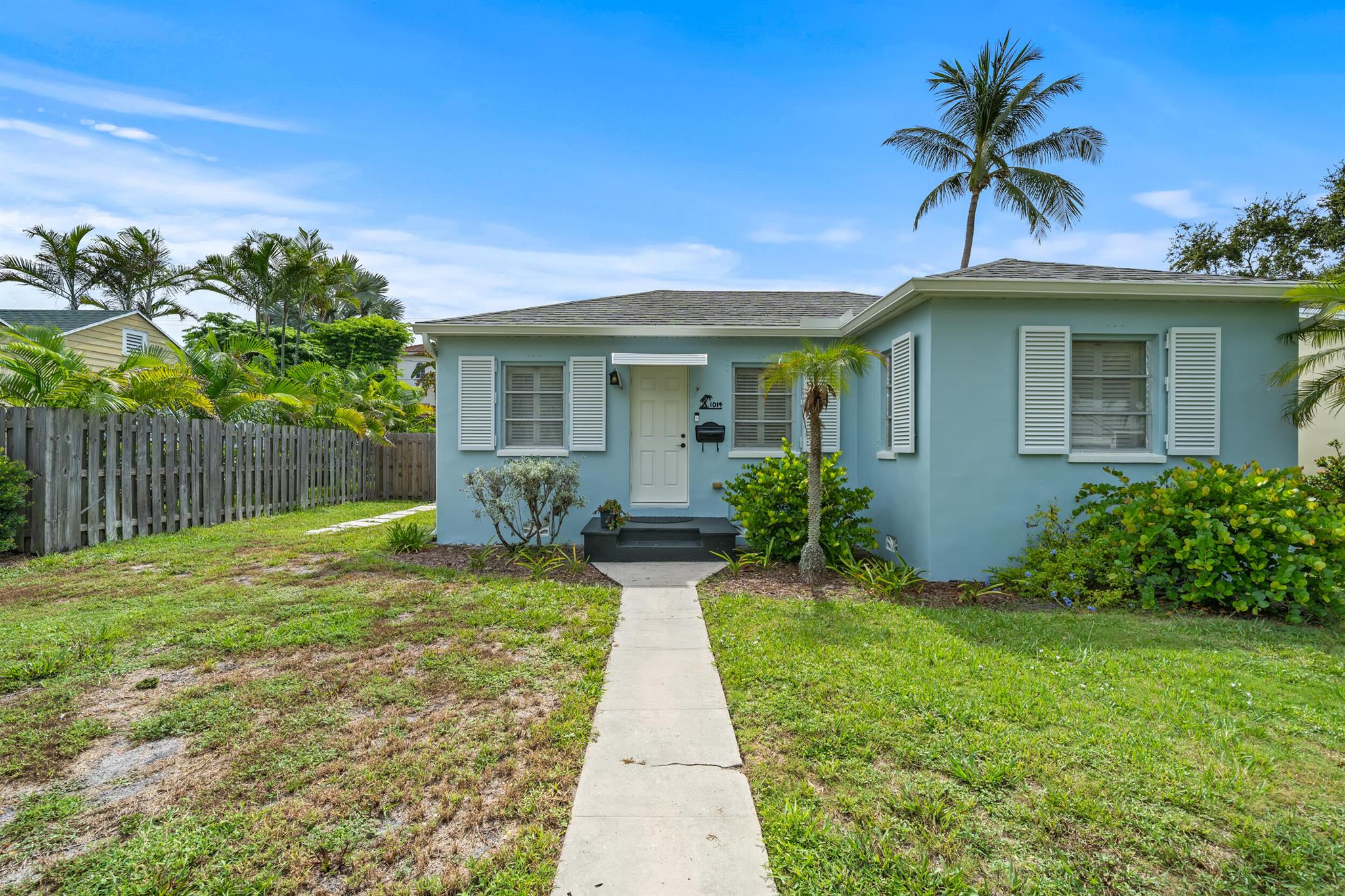 Look no further--your gem in Lake Worth Beach awaits! This charming and lovingly maintained home is ideally located just minutes from shopping, dining, and the beach. Featuring 2 spacious bedrooms and 2 full bathrooms--one with a tub and one with a walk-in shower--it's designed to meet the needs of any household. A generous Florida room, previously used as a third bedroom and complete with a large closet, offers flexible space that can be used as a bonus room, TV lounge, or additional living area. From here, elegant French doors open to a fully fenced backyard--your private oasis for relaxation, entertaining, or simply enjoying the outdoors. Pride of ownership shines throughout this home.