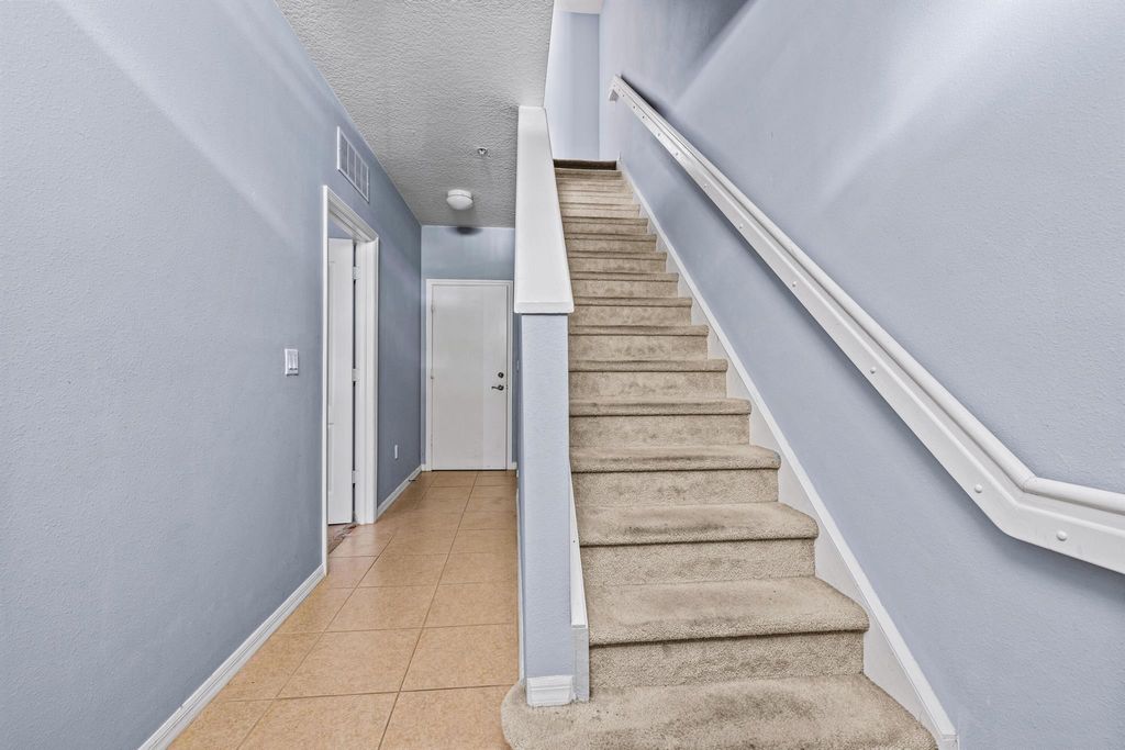 Photo of 1944 SE High Springs Drive, Port Saint Lucie, FL 34952 (MLS # R10985378)