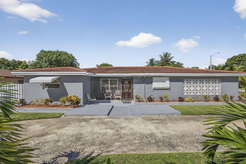 Photo of 118 2nd Street, Lake Park, FL 33403 (MLS # R11127494)
