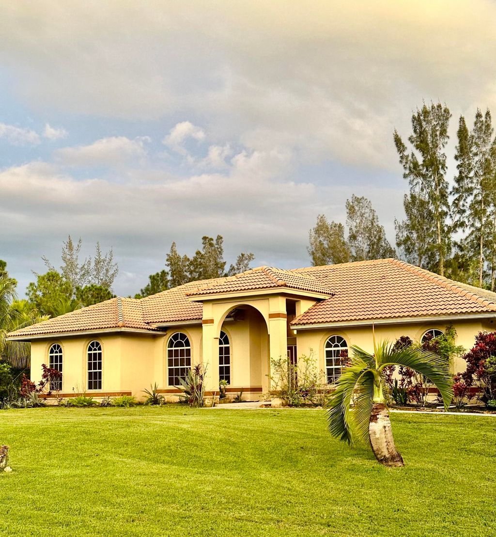 Photo of 13638 88th Place N, West Palm Beach, FL 33412 (MLS # R11122596)