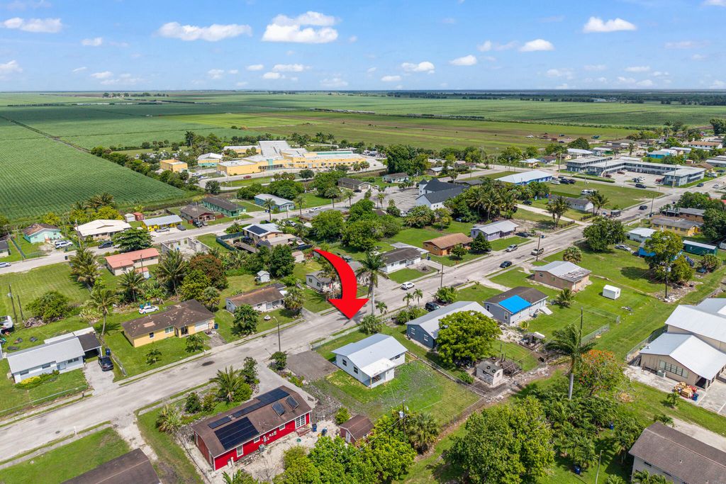 Photo of 245 SW 11th Avenue, South Bay, FL 33493 (MLS # B26036083)