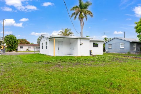 Tiny photo for 245 SW 11th Avenue, South Bay, FL 33493 (MLS # B26036083)