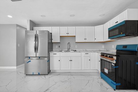 Tiny photo for 245 SW 11th Avenue, South Bay, FL 33493 (MLS # B26036083)