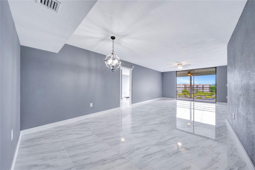 Photo of 1100 Saint Charles Pl #708, Pembroke Pines, FL 33026 (MLS # F10531705)