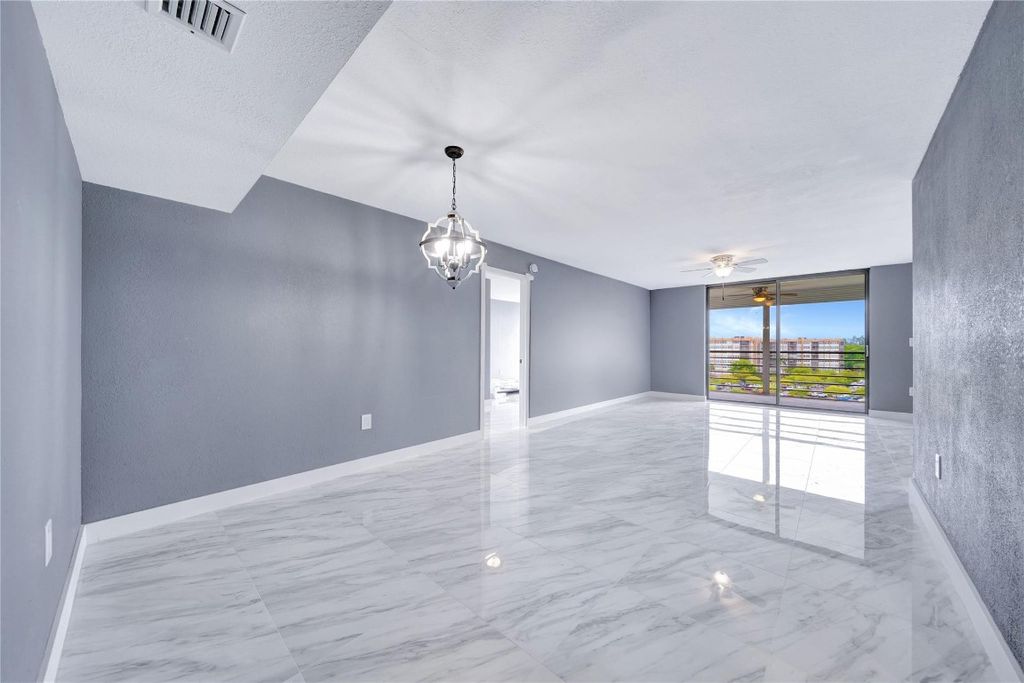 Photo of 1100 Saint Charles Place #708, Pembroke Pines, FL 33026 (MLS # F10531705)