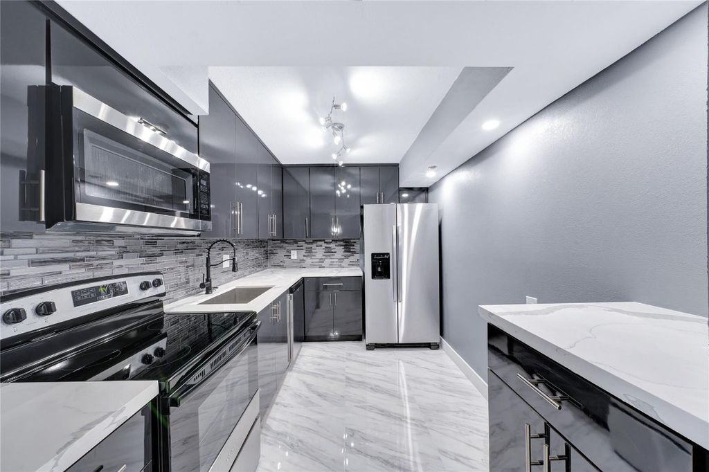 Photo of 1100 Saint Charles Place #708, Pembroke Pines, FL 33026 (MLS # F10531705)