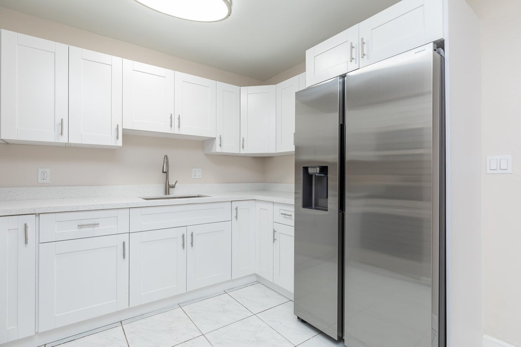 Photo of 7750 SW 10th Court #B, North Lauderdale, FL 33068 (MLS # B26045083)