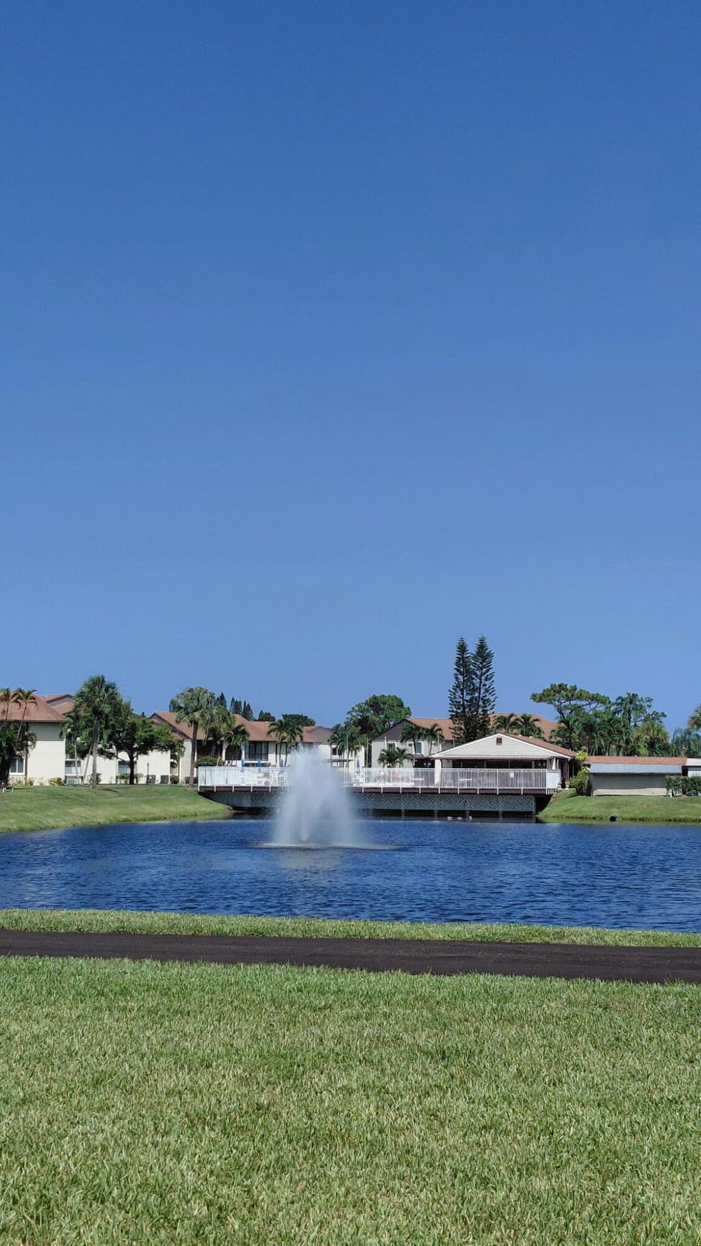 Photo of 5991 Whispering Pine Way #C2, Greenacres, FL 33463 (MLS # B26072867)