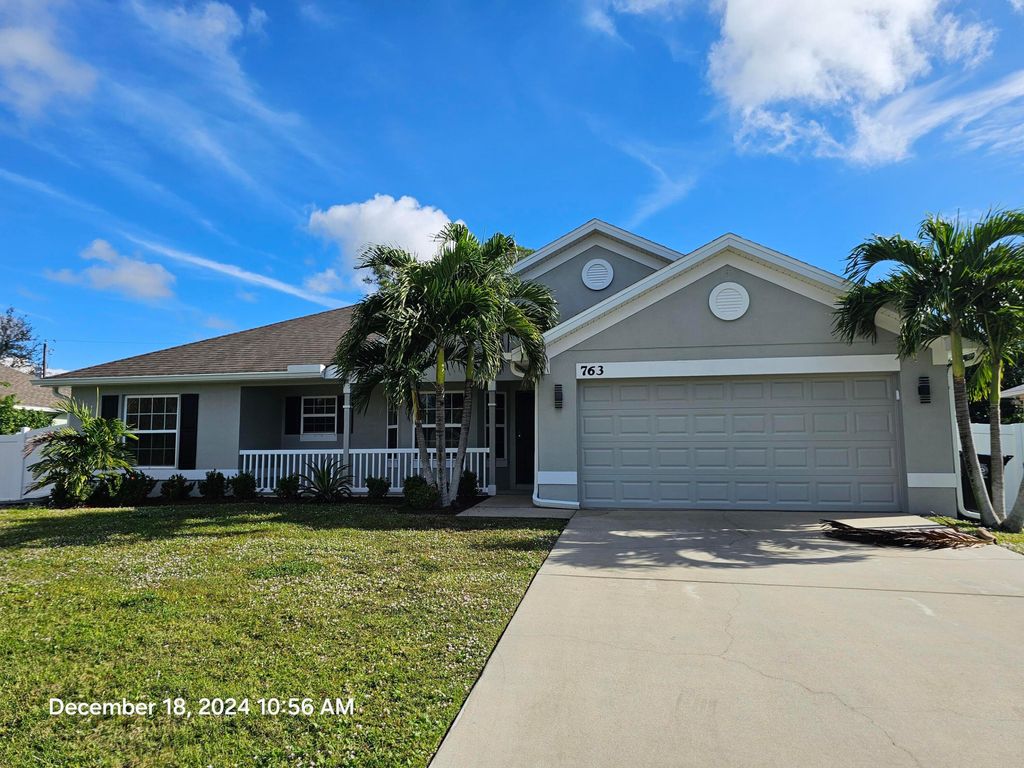 Photo of 763 SW Hogan Street, Port Saint Lucie, FL 34983 (MLS # B26014710)