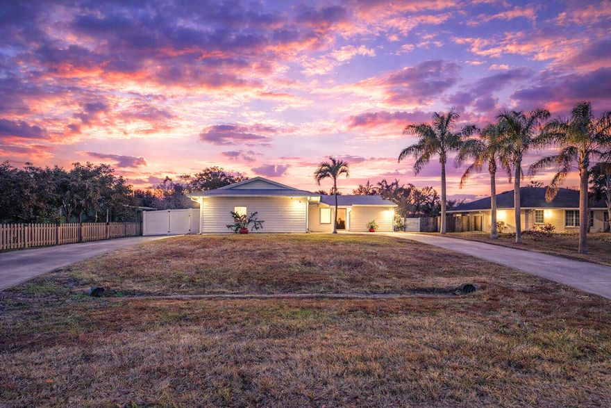 Awesome starter or retiree home located in desirable neighborhood! This home offers three bedrooms and two bathrooms, featuring tile flooring throughout, a  relaxing screened in porch and ample parking for all your toys! Abundant tropical landscape thought-out the large fenced back yard. Stainless Steel Appliances in kitchen. Master Bedroom Walk-in Closet. Metal Roof and Gutters installed in 2024. A/C was replaced in 2019 and Hot Water Heater in 2023. Schedule your showing today and see how this could be the one for you!