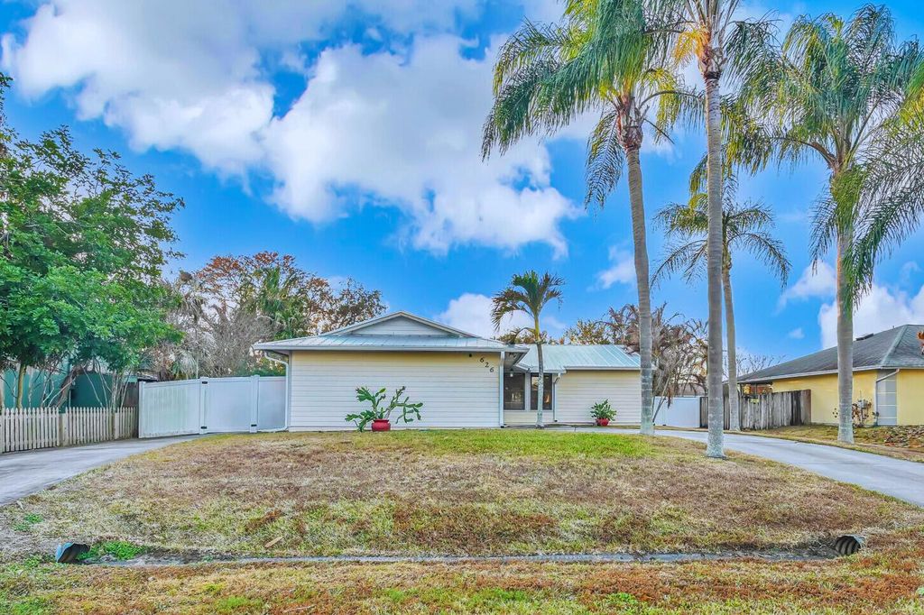 Photo of 626 SW Cynthia Street, Port Saint Lucie, FL 34983 (MLS # R11164610)