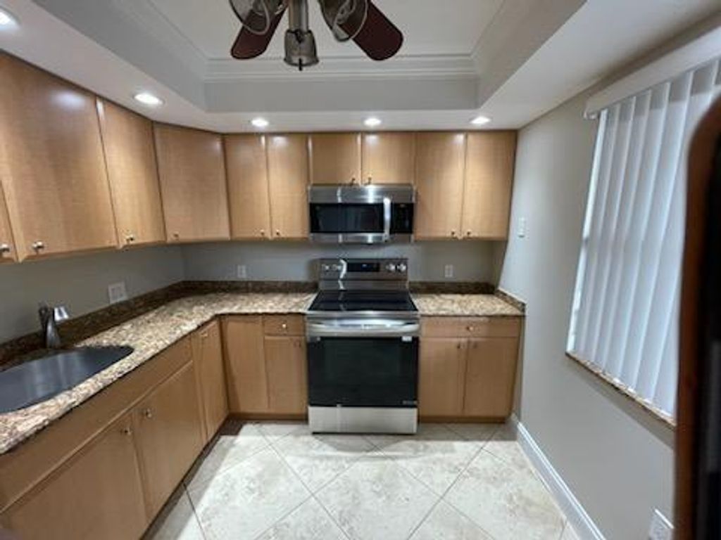 Photo of 2424 N Federal Highway #210, Boynton Beach, FL 33435 (MLS # R10944766)