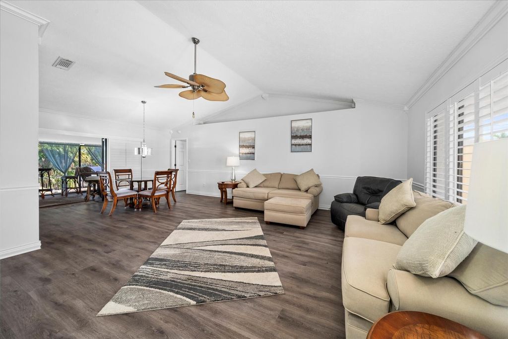 Photo of 697 SE Whitmore Drive, Port Saint Lucie, FL 34984 (MLS # R10958047)