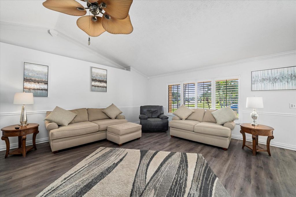 Photo of 697 SE Whitmore Drive, Port Saint Lucie, FL 34984 (MLS # R10958047)