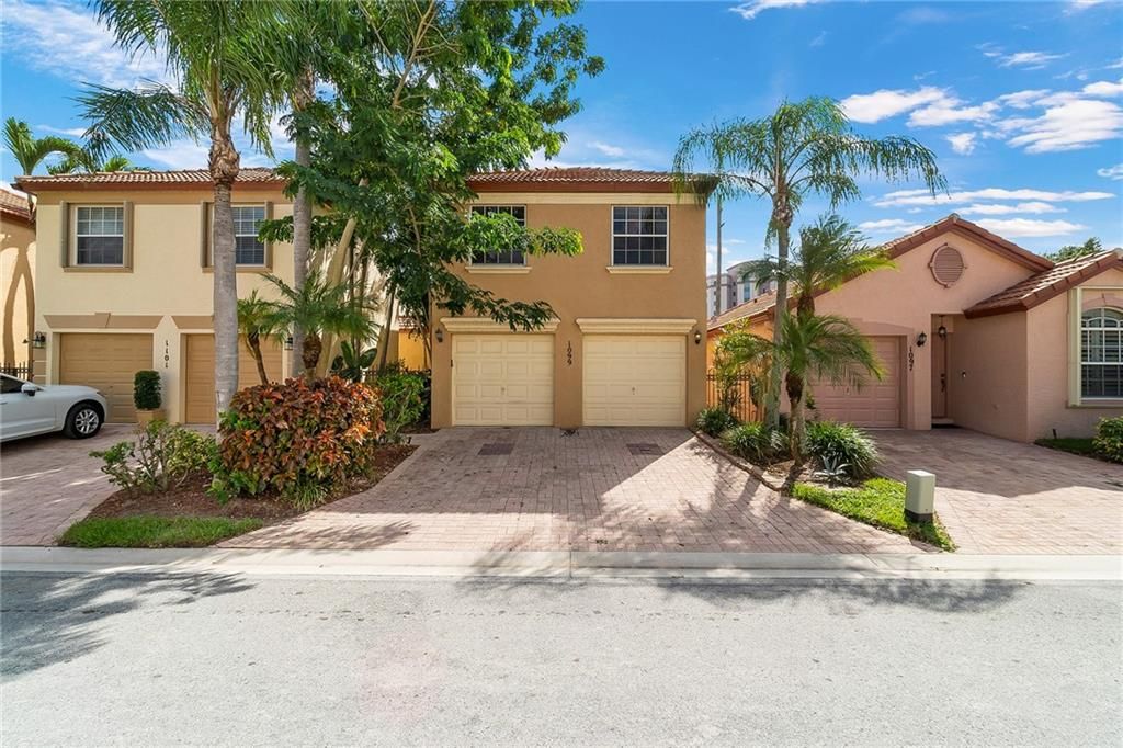 Photo of 1099 Via Jardin #1099, Riviera Beach, FL 33418 (MLS # F10306209)