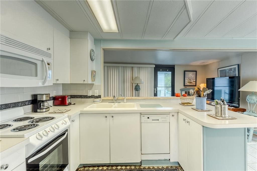Photo of 1039 Nettles Blvd, Jensen Beach, FL 34957 (MLS # F10308946)
