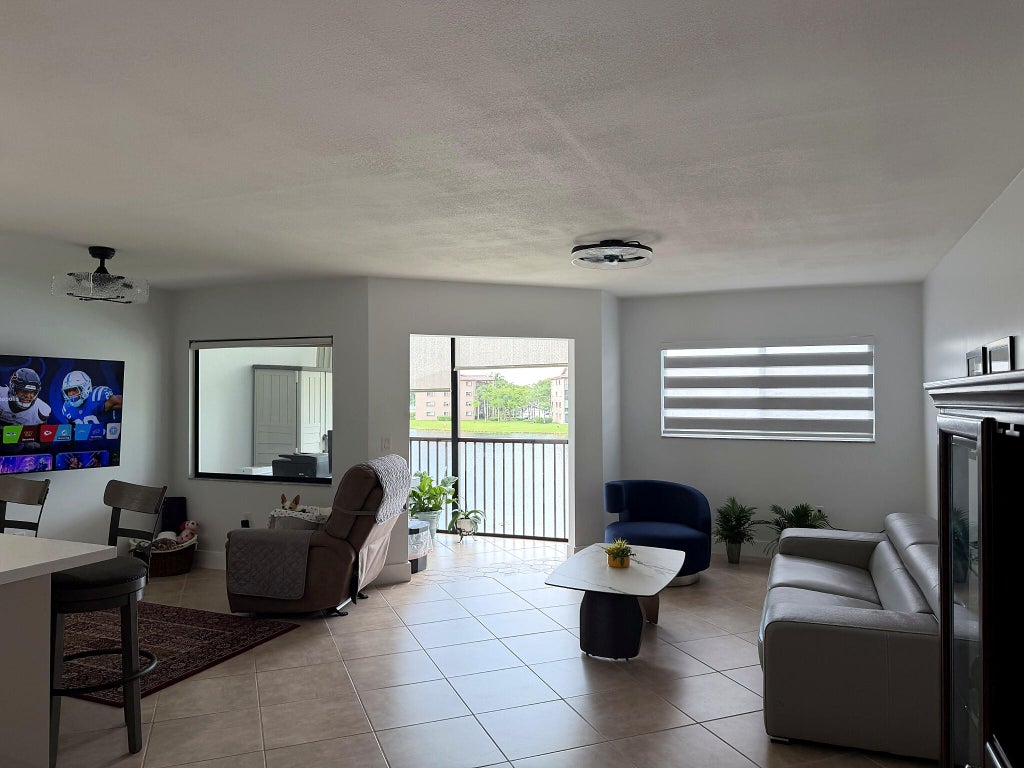 Photo of 13705 SW 12TH Street #311B, Pembroke Pines, FL 33027 (MLS # B26080182)