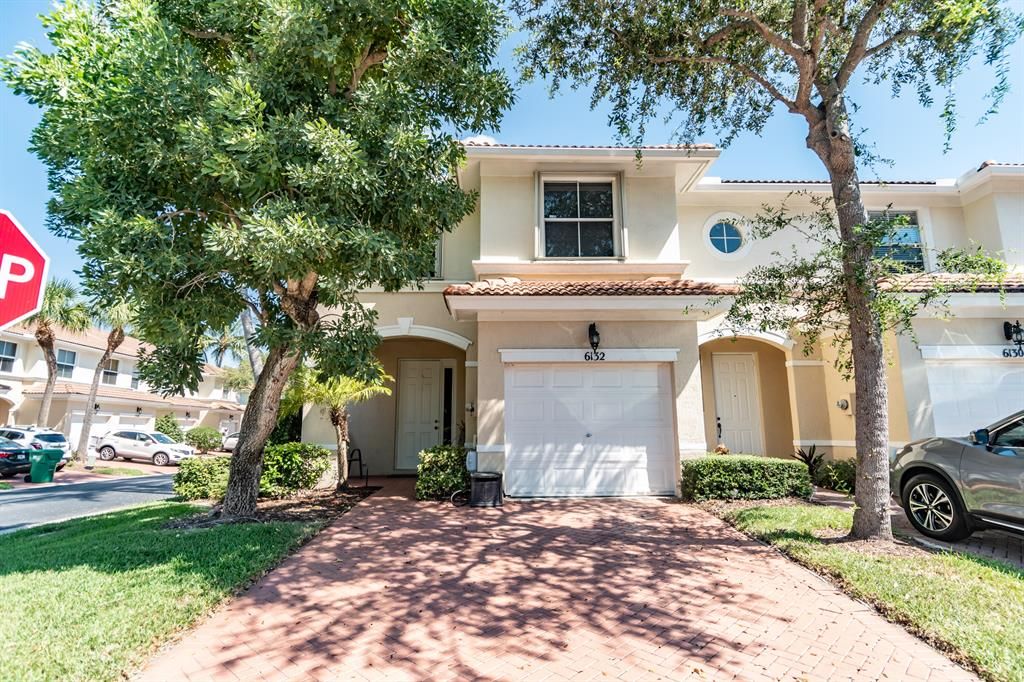 Photo of 6132 Seminole Gardens Circle Cir, Riviera Beach, FL 33418 (MLS # R10830950)