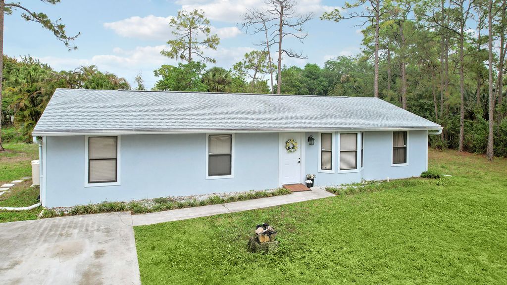 Photo of 14241 N 79th Ct Court N, Loxahatchee, FL 33470 (MLS # B26011958)