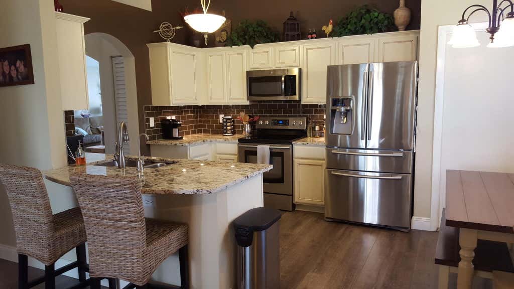 Photo of 67 Kingfisher Way, Boynton Beach, FL 33436 (MLS # B26062514)
