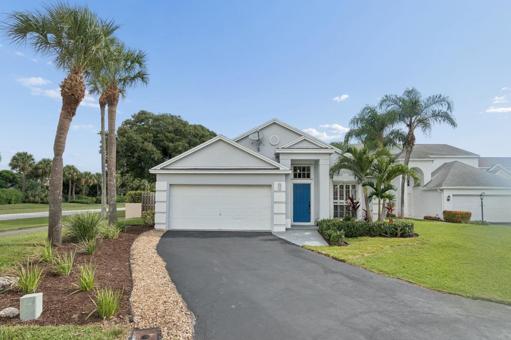 Photo of 67 Kingfisher Way, Boynton Beach, FL 33436 (MLS # B26062514)