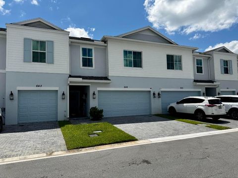 Photo of 649 NE Waters Edge Lane, Port Saint Lucie, FL 34983 (MLS # R11149397)