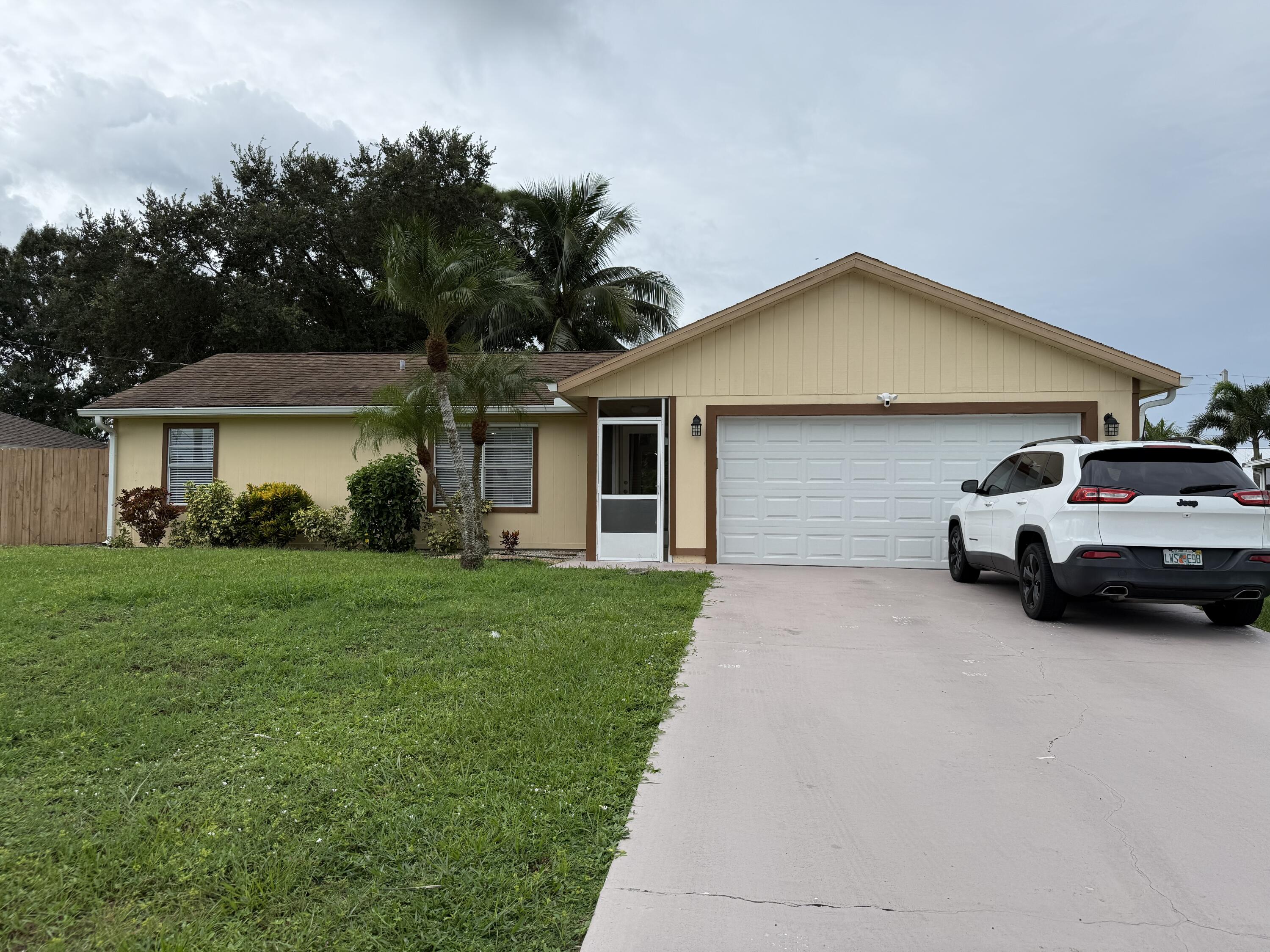 Beautifully maintained 3-bedroom, 2-bath home featuring a modern kitchen with stainless steel appliances and elegant granite countertops. Enjoy Florida living in the tropical, private backyard with mature landscaping and a spacious shed included. Conveniently located close to I-95 and the Florida Turnpike for easy commuting!
