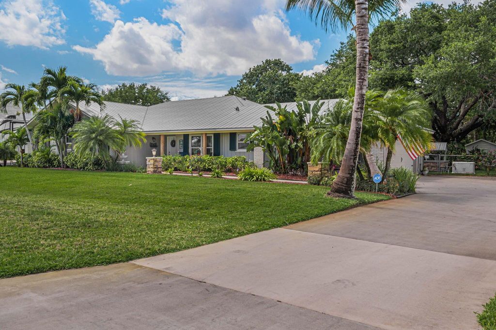 Photo of 626 SE Hidden River Drive, Port Saint Lucie, FL 34983 (MLS # R10972268)