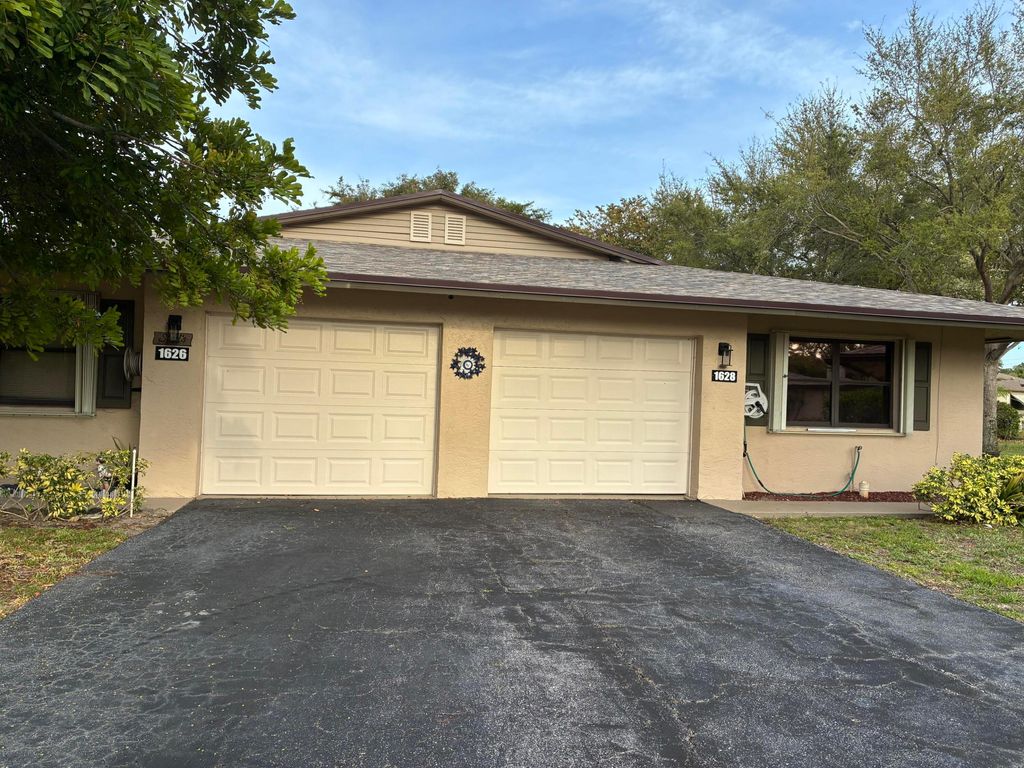 Photo of 1628 Palmland Dr, Boynton Beach, FL 33436 (MLS # B26000967)