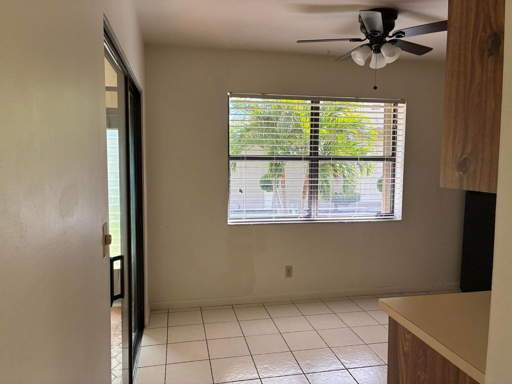 Photo of 1628 Palmland Dr, Boynton Beach, FL 33436 (MLS # B26000967)