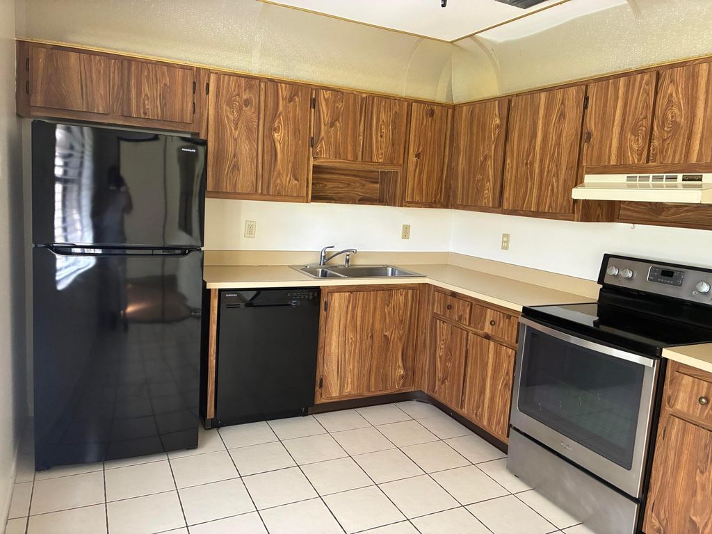 Photo of 1628 Palmland Dr, Boynton Beach, FL 33436 (MLS # B26000967)